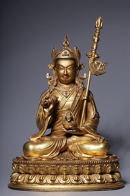 A seated statue of a copper-gilt golden lotus peanut in the Qing Dynasty
