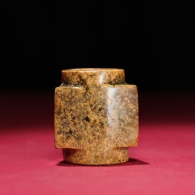 A piece of Han Dynasty jade triangular cong