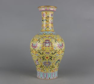 A Qing Qianlong yellow pastel gold-painted eight-treasure pattern