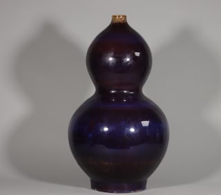A Qing Dynasty Qianlong kiln glazed gourd bottle
