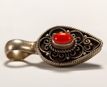 A Qing Dynasty Tibetan silver earrings