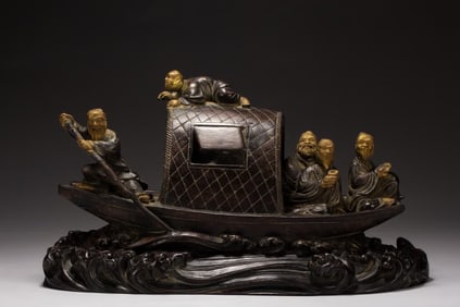 A fishing boat ornament of agarwood figures in the Qing Dynasty
