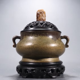 A Chongzhen model copper tire dragon ear aromatherapy stove