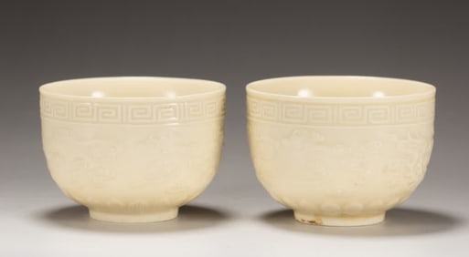 A pair of fixed kiln dragon and phoenix cups