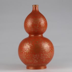 A Qing Qianlong coral red gold-painted flower gourd bottle