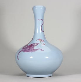 A Qing Dynasty Jiaqing azure glazed carmine red dragon pattern garlic bottle