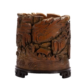 A Qing Dynasty bamboo carved figure pen holder