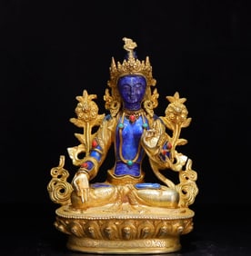A piece of copper gilt inlaid with lapis lazuli white Tara