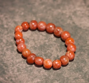 A Qing Dynasty red agate bracelet