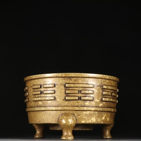 A Ming Dynasty Xuande copper tire Bagua pattern three-legged incense burner