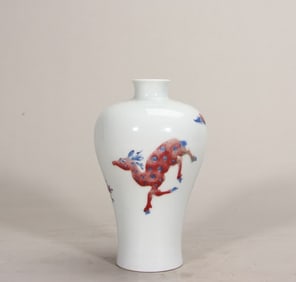 A Qing Dynasty Yongzheng blue and white glaze red Fu deer holding a mushroom plum bottle