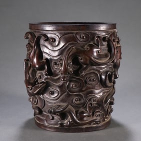 A Qing Dynasty rosewood dragon pattern pen holder