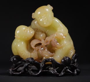 A Qing Dynasty topaz carving "Double Children's Birthday" ornament