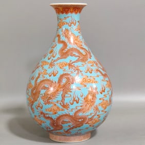 A Qing Dynasty Qianlong turquoise green Gonghong Kowloon jade pot spring vase