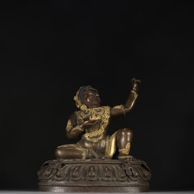A Ming Dynasty copper gilt great achiever