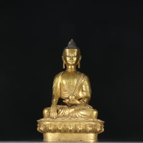 A bronze gilt statue of the Medicine Buddha