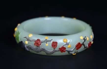 A Qing Dynasty Hetian jade eight-treasure embedded bracelet