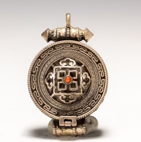 A Qing Dynasty Tibetan silver gawu box