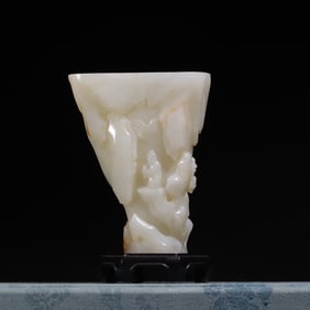 A Qing Dynasty Hetian jade Matsushita Coats and a boy visiting friends rhinoceros horn cup