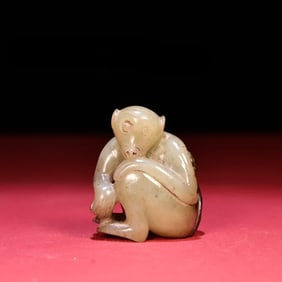 A Han Dynasty jade monkey handle