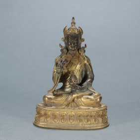 A bronze gilt statue of the peanut master