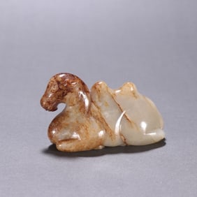 A Qing Dynasty seed material Hetian jade camel ornament