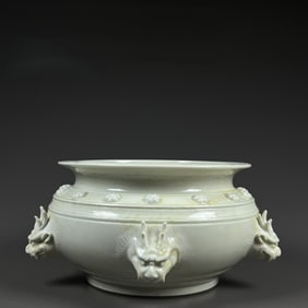 A piece of Song Ding kiln carved dragon head furnace