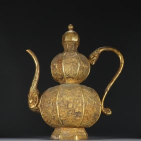 A Tang silver gilt flower and bird pattern gourd-shaped wine jug