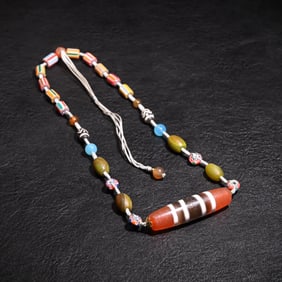 A Tibetan agate dzi necklace