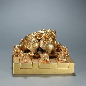 A set of copper gilt beast button seals