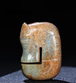 A Han Dynasty seed pig dragon ornament