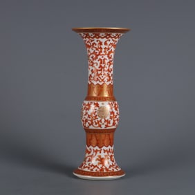 A Qing Qianlong year alum red gold-coated entwined longevity pattern flower cup