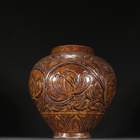A sauce glaze carved jar