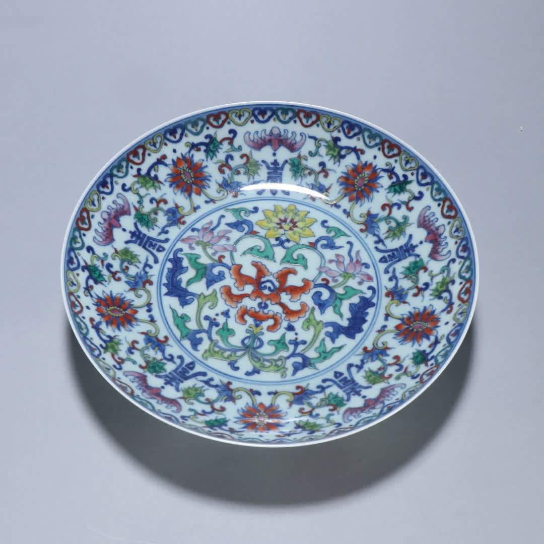A Qing Dynasty Doucai entwined pattern plate: Qing Dynasty Doucai entwined pattern plate SIZE: Height 4cm Width 20cm (The Dimensions Of All Batches Are Manually Measured.If You Need More Detailed Information, Please Contact Our Customer Service B