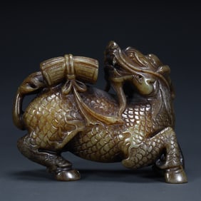 Qing Dynasty Hetian jade "Qilin Sending Books" carving