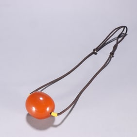 A beeswax bead clavicle chain