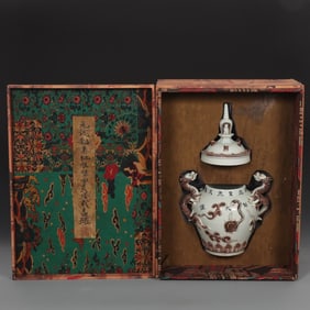 A Yuan Dynasty glazed red pile plastic four-spirit pagoda lid jar