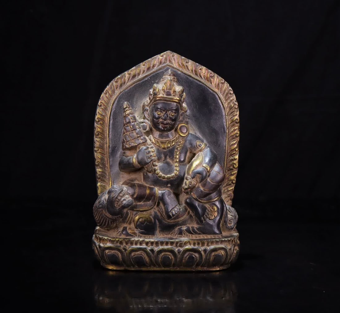 A black stone carved treasure king (1 of 9)