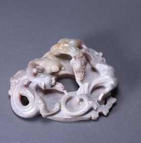 An ancient jade plate dragon pattern