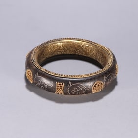 A silver gilt silver longevity bracelet with agarwood bags