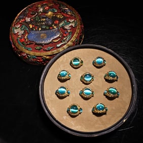 A box of cat's eye rings