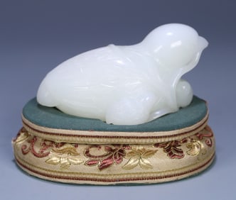 A Qing Dynasty Hetian white jade seed material quail ornament