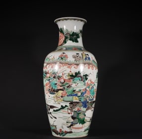A Qing Dynasty Kangxi colorful figure sword and horse picture Guanyin vase