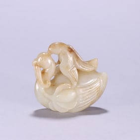 A Qing Dynasty Hetian jade goose carved with a wheat ear