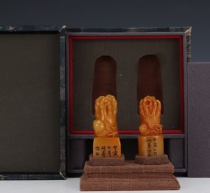 A pair of boutique field yellow beast button seals