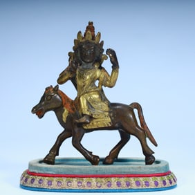 Qing Dynasty bronze gilt riding statue (Tibetan Buddhist style)