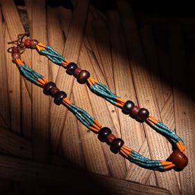 A glazed Tibetan necklace