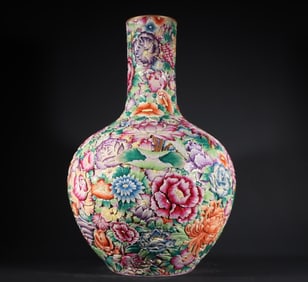 A Qing Dynasty Qianlong ten thousand flowers high relief peony flower pattern sky ball vase