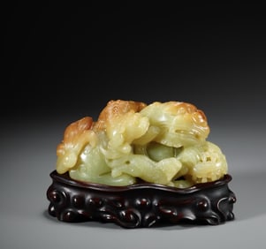 A Qing Dynasty Hetian topaz Taishi Shaoshi ornament