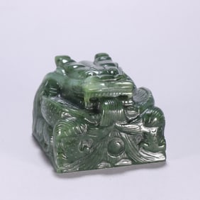 A piece of jasper dragon button seal